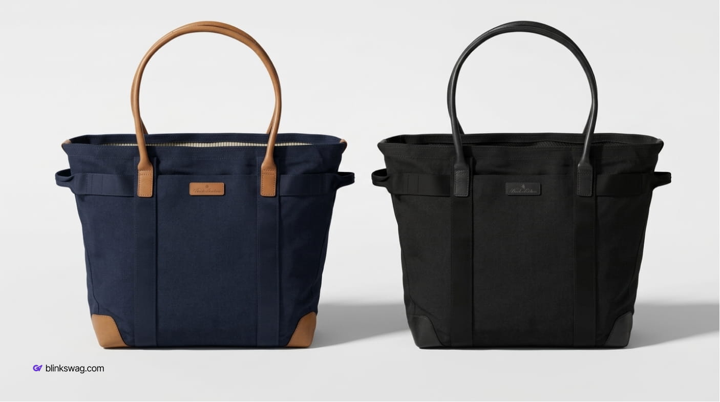 Navy blue and black Brooks Brothers canvas laptop tote bags with leather handles and reinforced base.