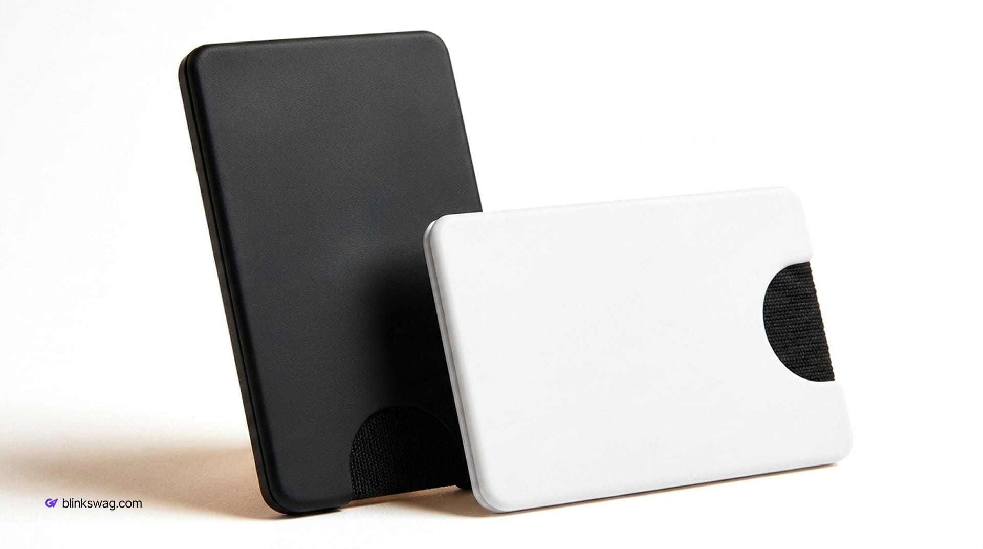 Sleek black and white MagSafe PopWallets displayed side by side against a neutral backdrop.